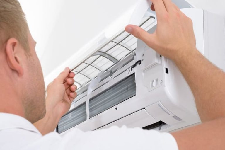 air con specialist checking split system