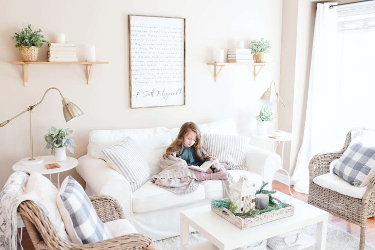 girl reading in the living room